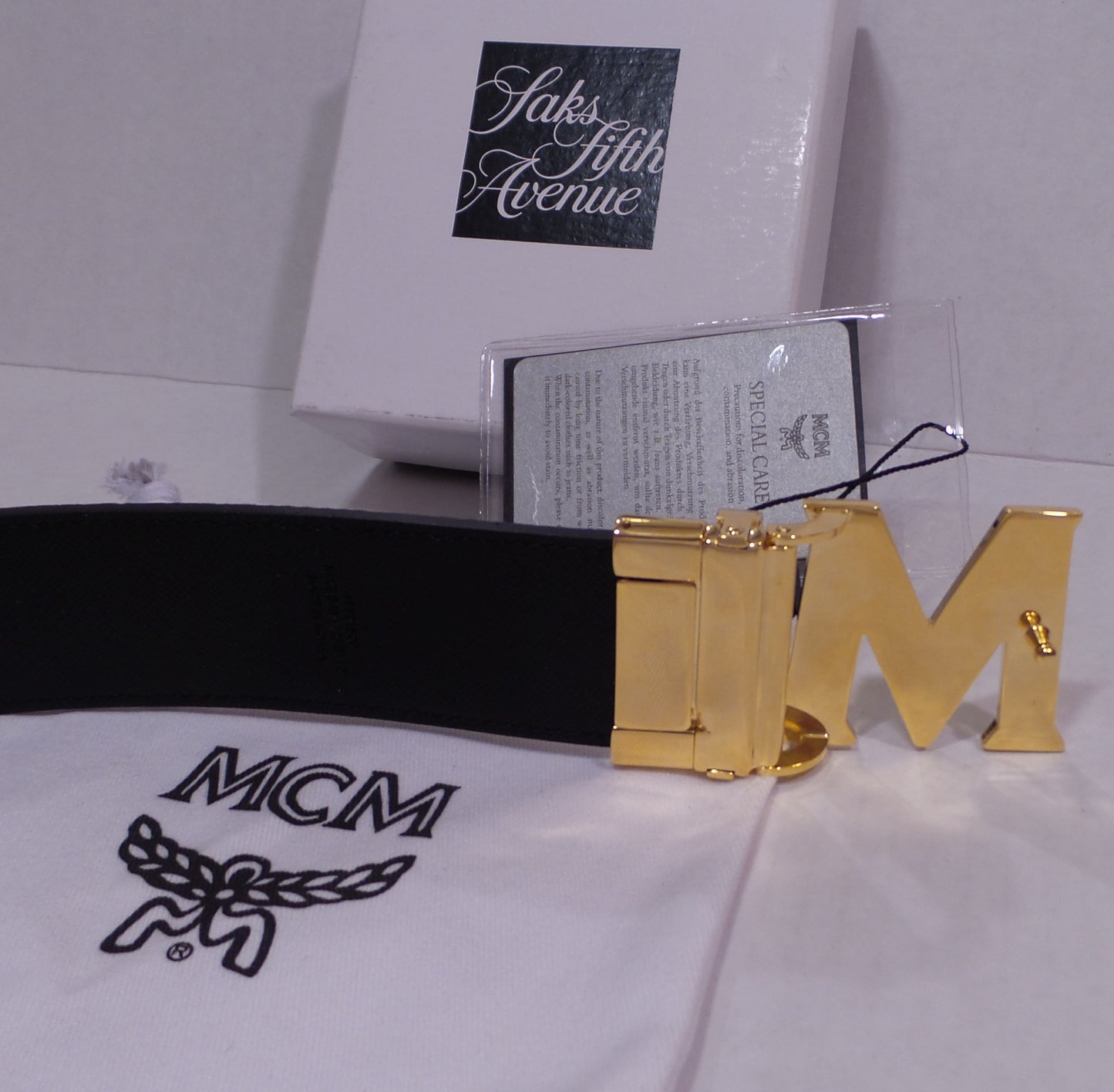 Reversible White Monogram Black Belt with Big Gold M Buckle